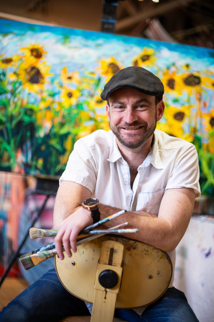 Drew Davis with painting palette